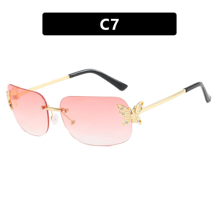 Women's fashionable sunglasses with filigree butterfly design and protective lenses Skanto