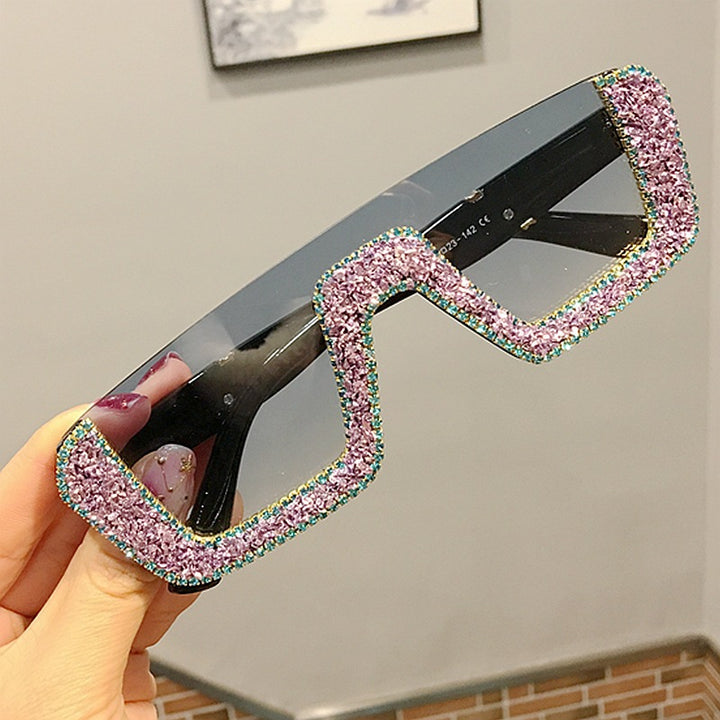 Dame elegant glitter-solbriller med markant ramme Skanto
