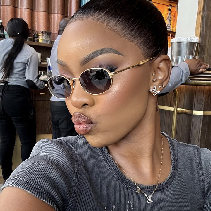 Women's robust round sunglasses with mirrored lenses Skanto