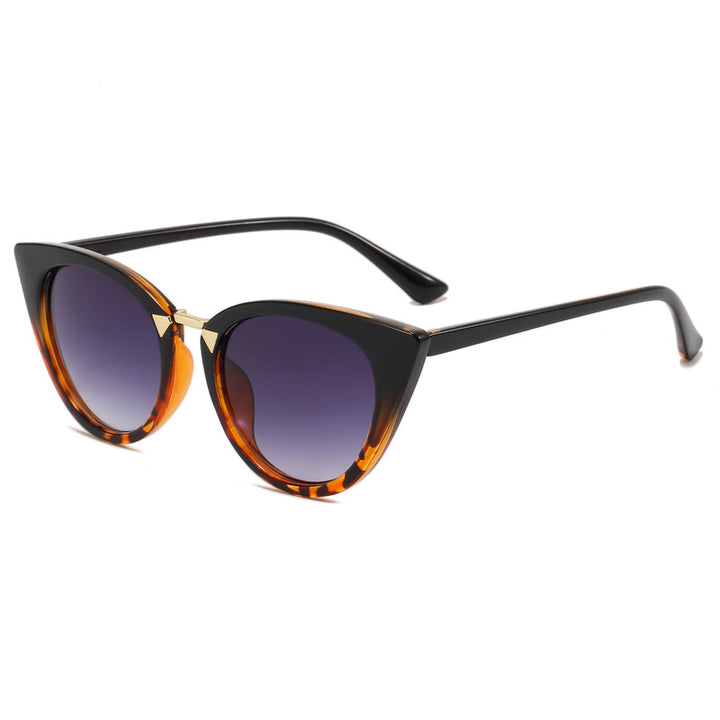 Dame Cat-Eye solbrille med elegant gull detaljer Skanto