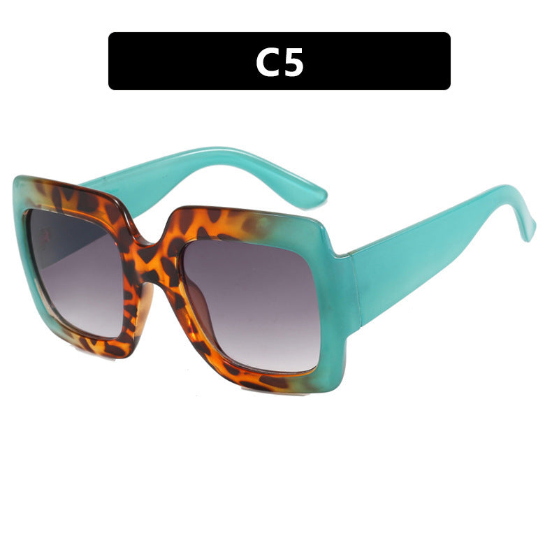 Dame oversized kvadratisk solbrille med markant skjoldpatt-design Skanto