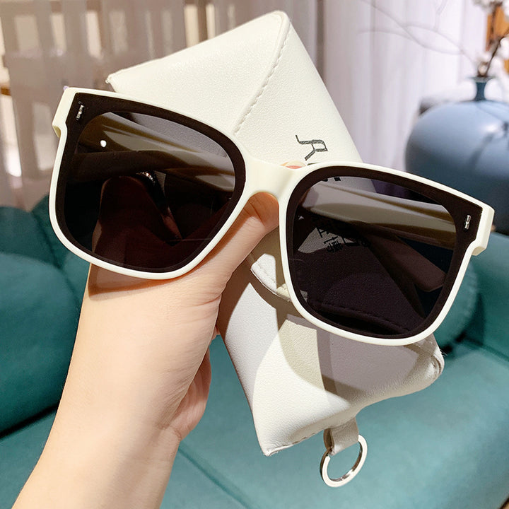 Dame Fashionable solbriller i trendy kvadratisk design Skanto
