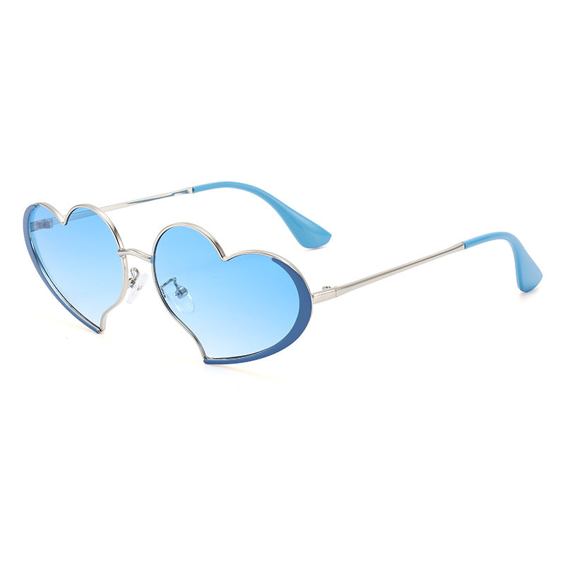 Dame hjerteformet solbrille med glamorøs ramme Skanto