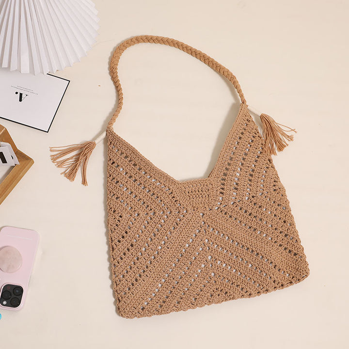 Handmade macrame shoulder bag with playful tassels Skanto