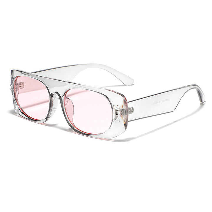 Dame moteriktig solbrille med transparant og geometrisk ramme Skanto