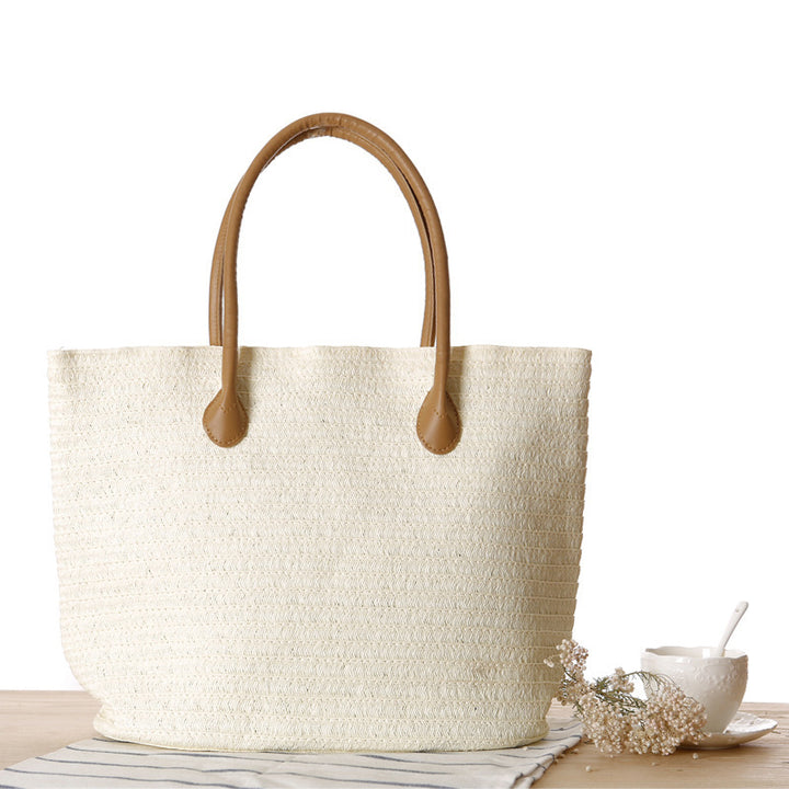 Spacious straw shopper with leather handles Skanto