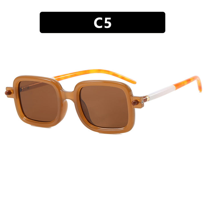 Dame firkantet solbrille med trendy ramme og komfortabel passform Skanto
