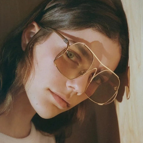 Women's geometric sunglasses with narrow metal frame and brown lenses Skanto