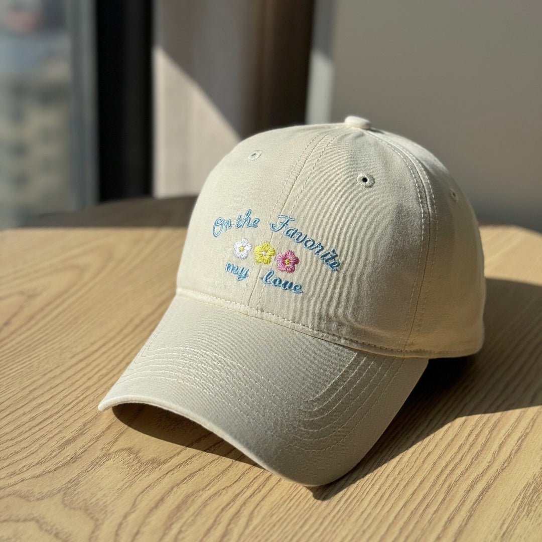Kvinners broderte tekstlue Skanto