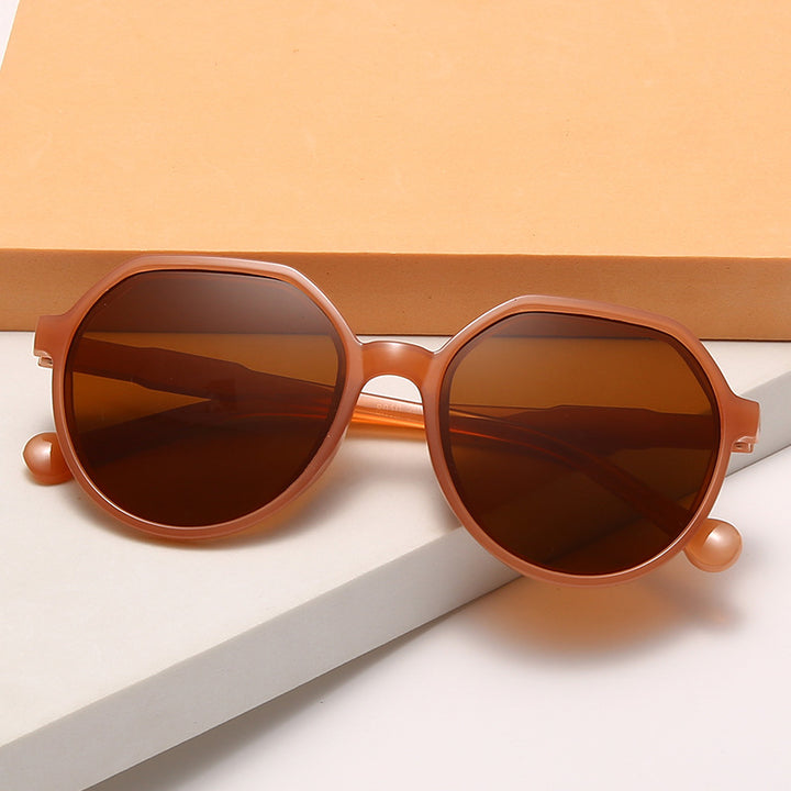 Dame moter solbrille med markant åttekant-design Skanto