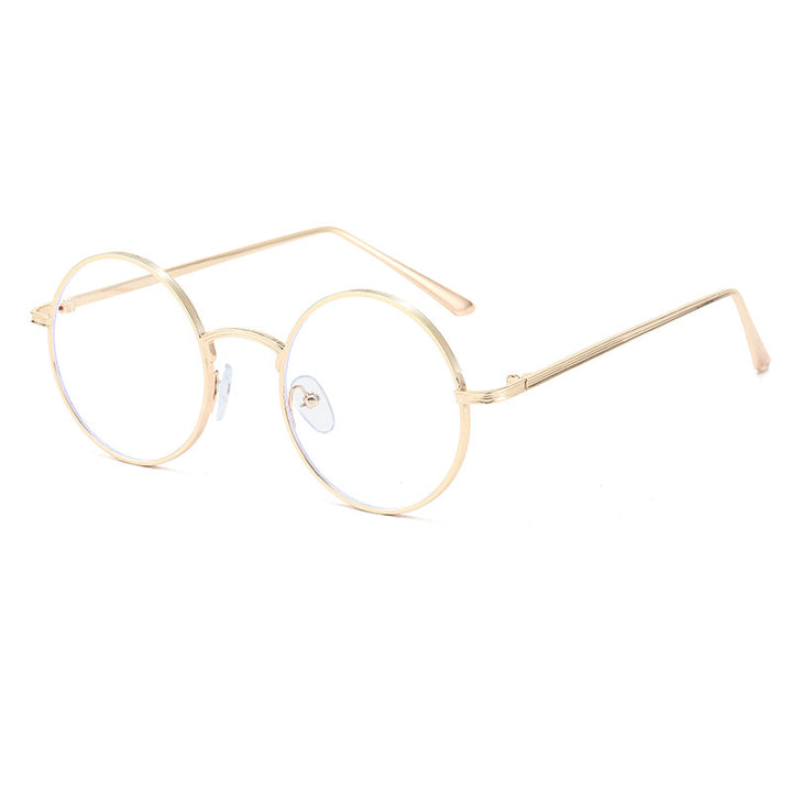 Damer moderne briller med runde glass og fin metallramme Skanto