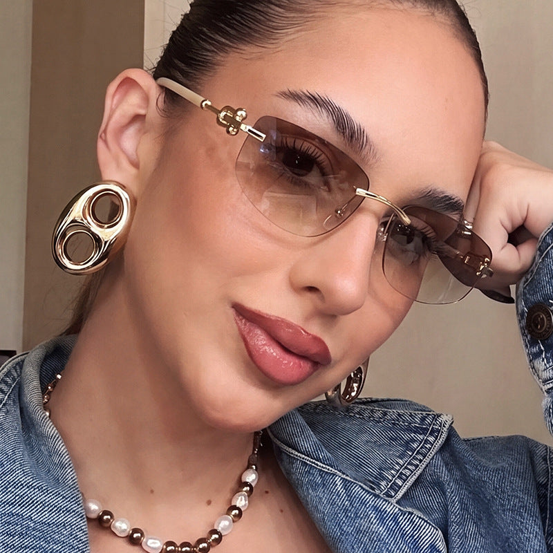 Women's elegant semi-rimless glasses with luxurious metal frame and clear lenses Skanto