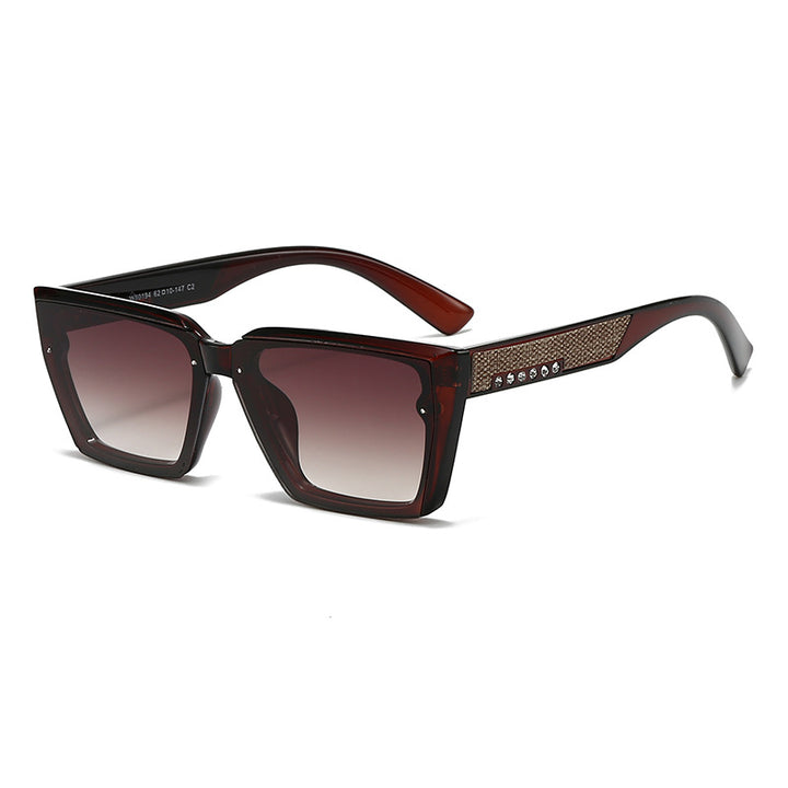 Dame stilig solbrille med glitrende detaljer Skanto