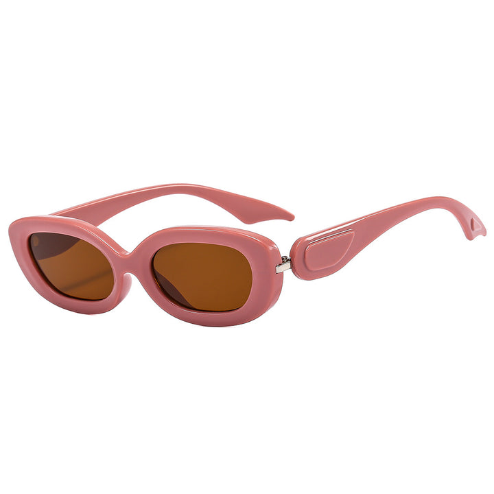 Dame moteriktig solbrille med stilfull buet ramme Skanto