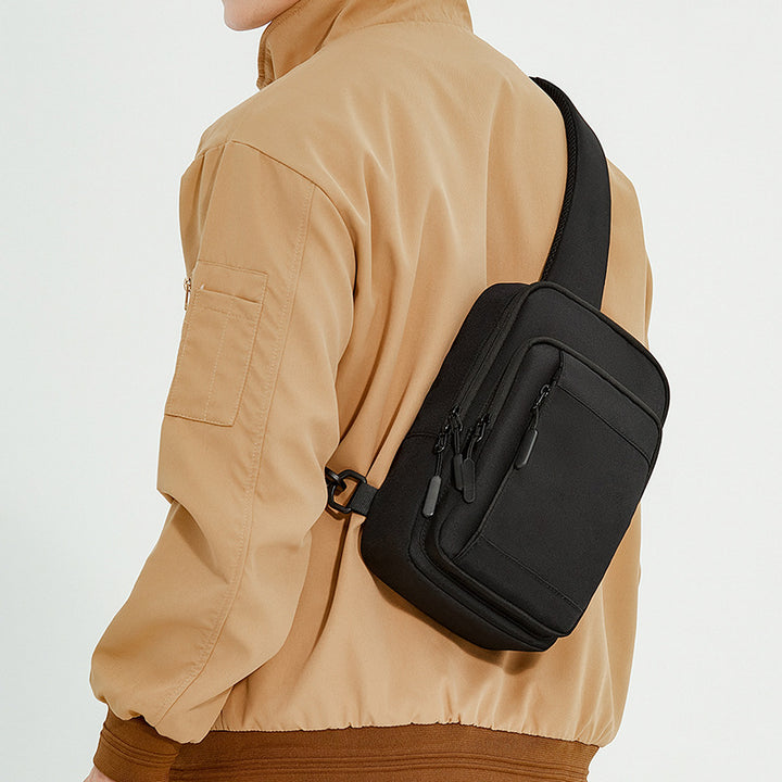 Kompakt Multi-Lomme Sling Bag Skanto