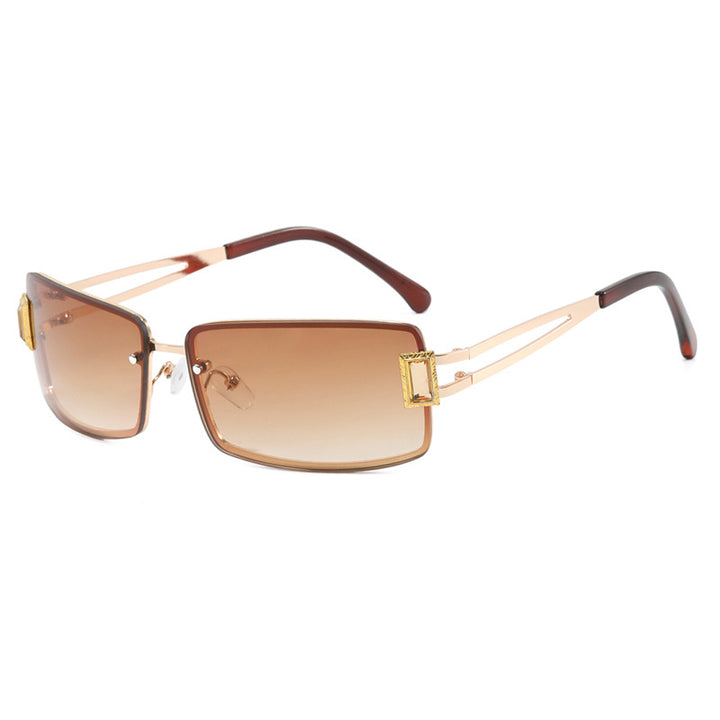 Stylish women's sunglasses with elegant trapezoidal lenses and filigree metal frame Skanto