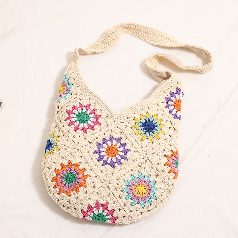 Handmade crocheted bag with colorful floral pattern Skanto