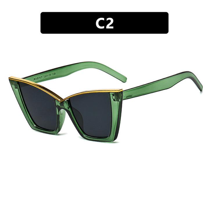 Dame ekstravagant solbrille med unik design og gullige aksenter Skanto