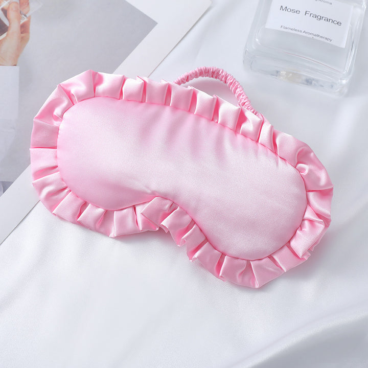 Dame nan satin-glinsende øyemaske med ergonomisk kontur, volangkant og myk polstring Skanto
