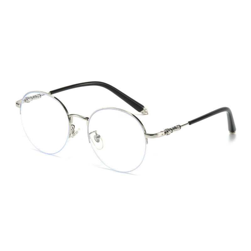 Dame rund solbrille med elegant metallramme og komfortable nesepads Skanto