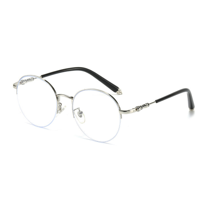 Dame rund solbrille med elegant metallramme og komfortable nesepads Skanto
