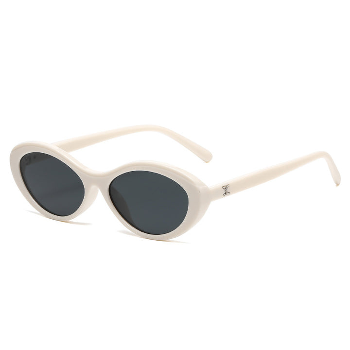 Dame stilige solbriller i oval design Skanto