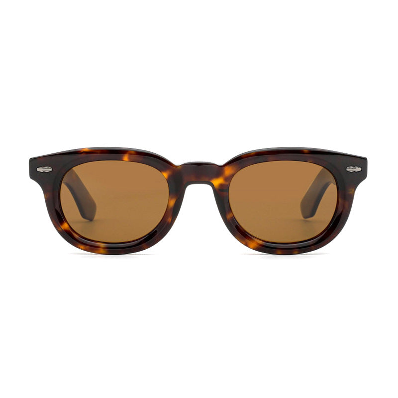 Dame retro-inspirert solbrille med bredt skilpadde-ramme og harmoniske glass Skanto