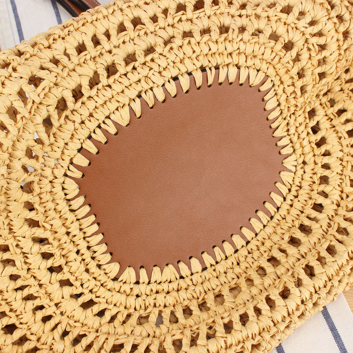 Woven natural material handbag with high-quality leather detail Skanto