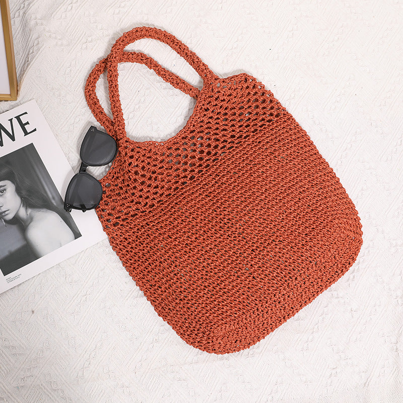 Hand-knotted raffia bag with long carrying handles Skanto