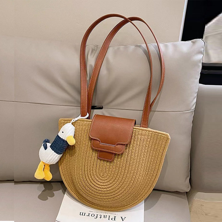 Modern tote bag made of woven material with playful pendant Skanto