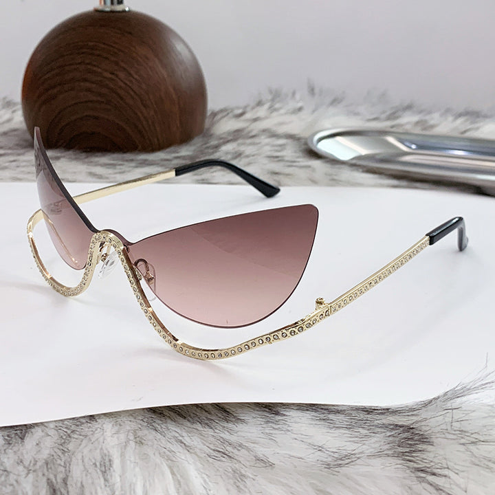 Women's extravagant shaped Cat-Eye sunglasses with sparkling applications Skanto