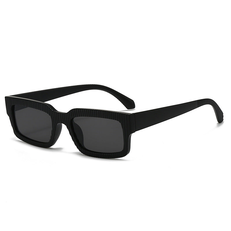 Dame moteriktig solbrille med geometrisk ramme Skanto