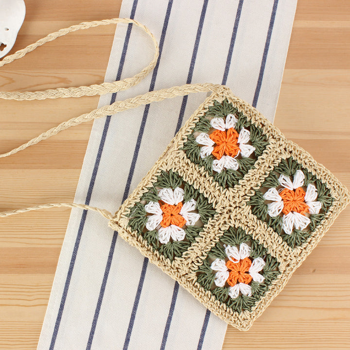 Hand-knotted shoulder bag in floral design Skanto