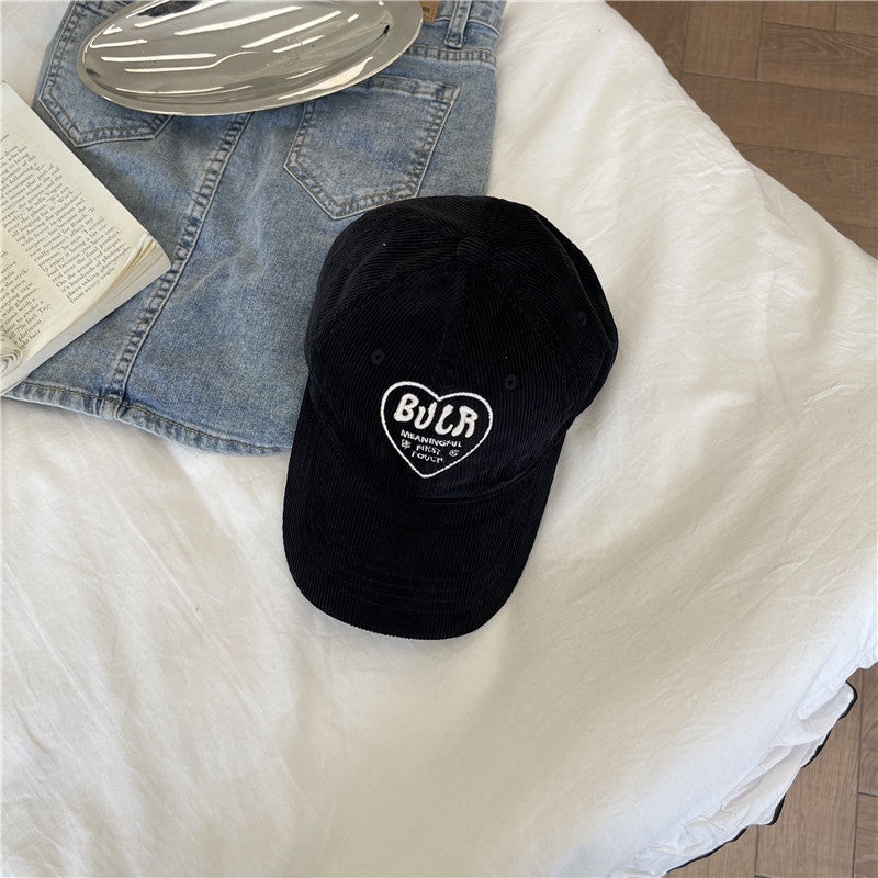 Kvinnens teksturerte kordfløyels baseball cap Skanto