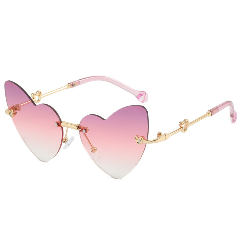 Damer hjerteformet solbrille med dekorert ramme Skanto