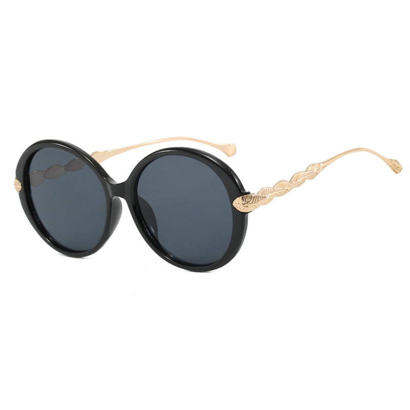 Women's large round sunglasses with decorative metal accents Skanto