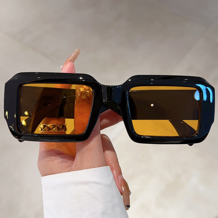 Dame oversized kvadratisk solbrille med moderne plastikkramme Skanto