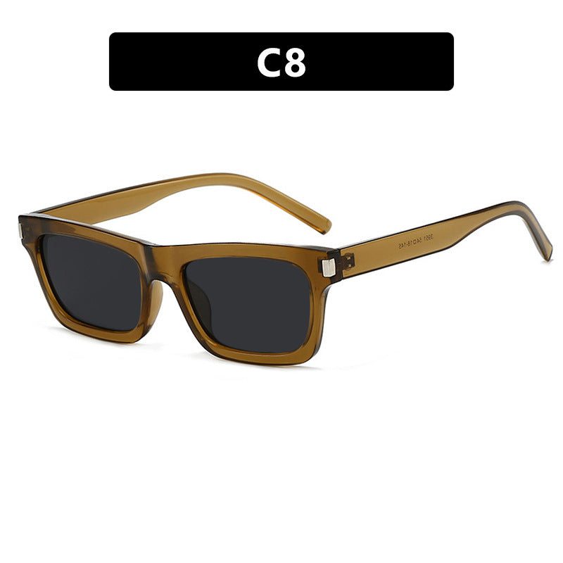 Dame kvadratisk solbrille med transparente linser og stillegant design Skanto
