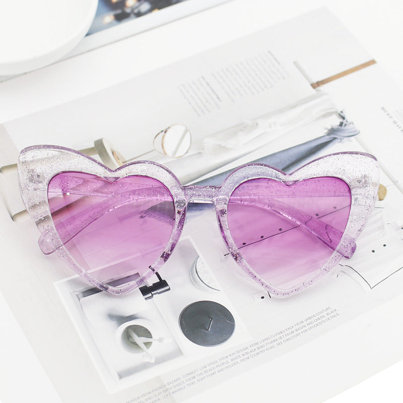 Dame hjerteformet solbrille med glitrende ramme Skanto