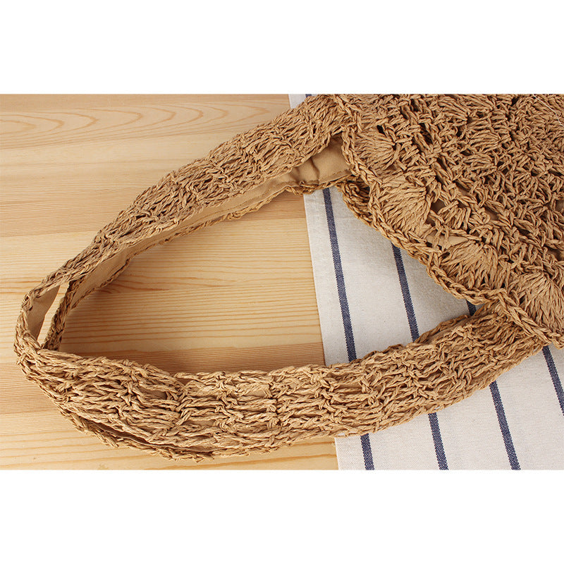 Hand-knotted beach bag with artistic round design Skanto