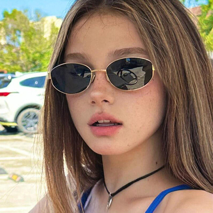 Women's stylish designer sunglasses with elegant metal frame Skanto