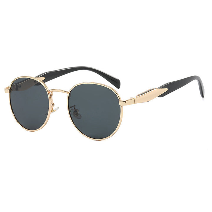 Dame rund solbrille med elegant, gullramme og UV-beskyttelse Skanto