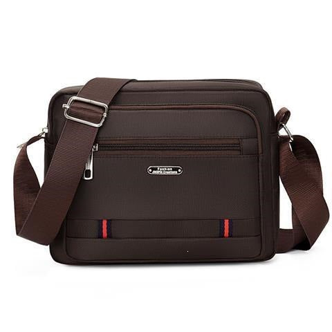 Praktisk crossbody-veske med multifunksjonelt fagssystem Skanto
