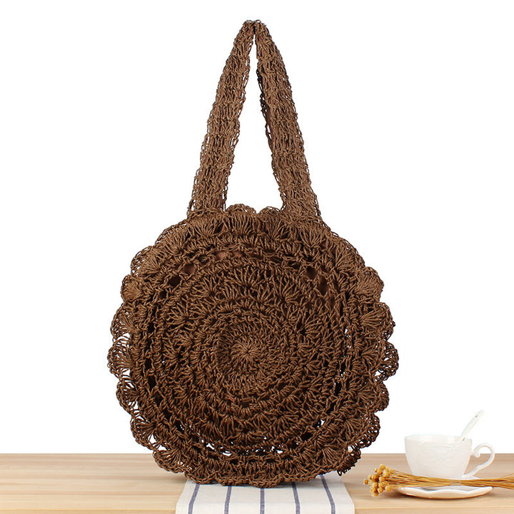 Hand-knotted beach bag with artistic round design Skanto