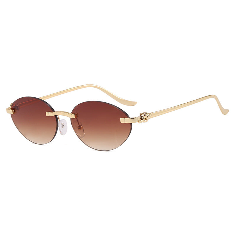 Women's elegant oval sunglasses with gold accent Skanto