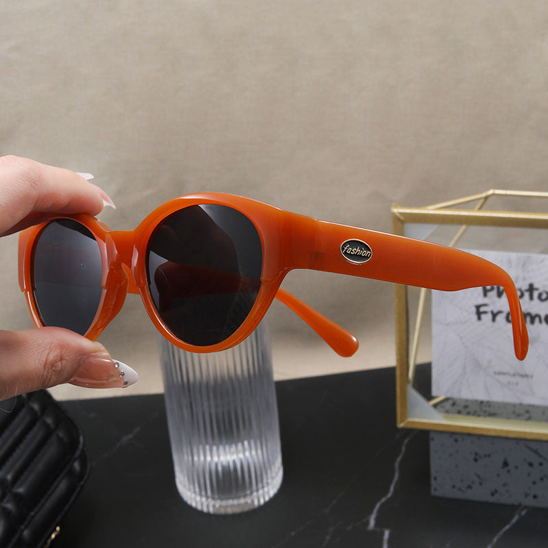 Dame Cat-Eye solbriller med eksotisk design og robust ramme Skanto