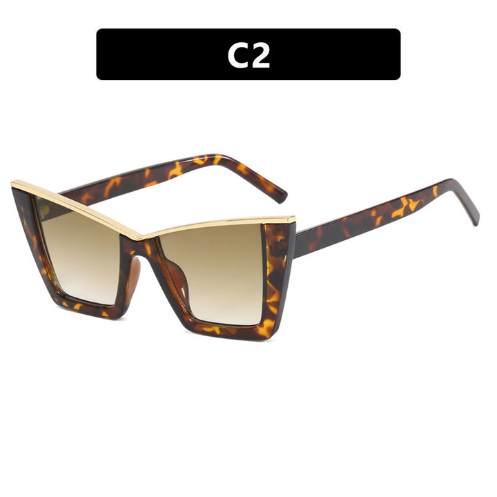 Dame moteriktig solbrille med unik geometrisk ramme Skanto