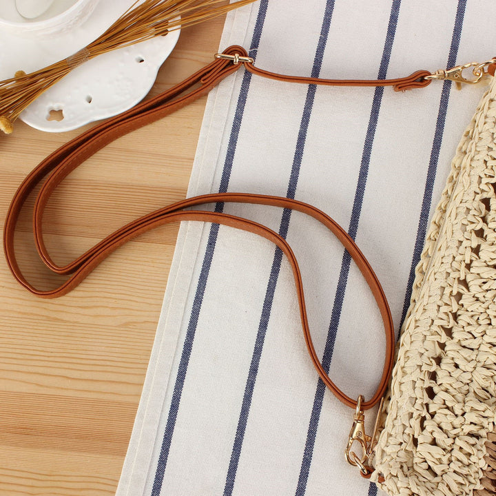 Ruffle design handbag made of braided raffia Skanto