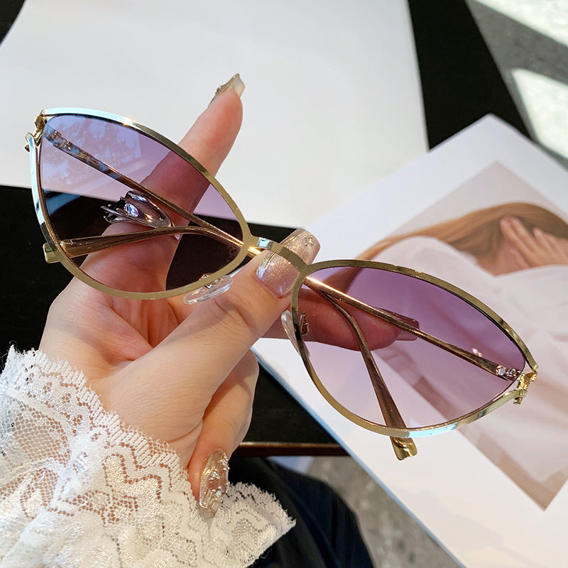 Dame Cat-Eye solbriller med elegant metallramme og UV-beskyttelse Skanto