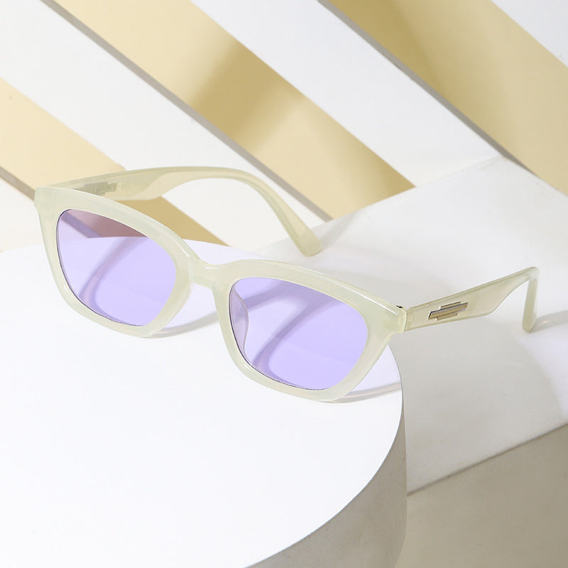 Dame moter Cat-Eye solbriller med transparent ramme og speilglass Skanto